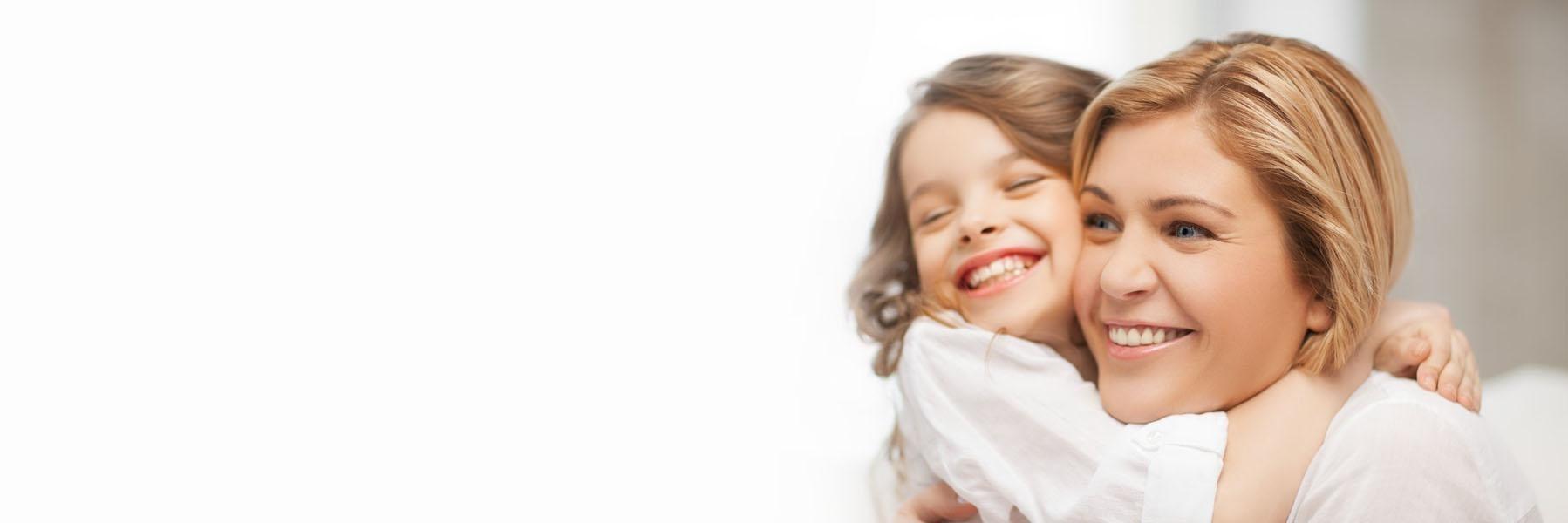 Mother and Daughter smiling after dentist appointment